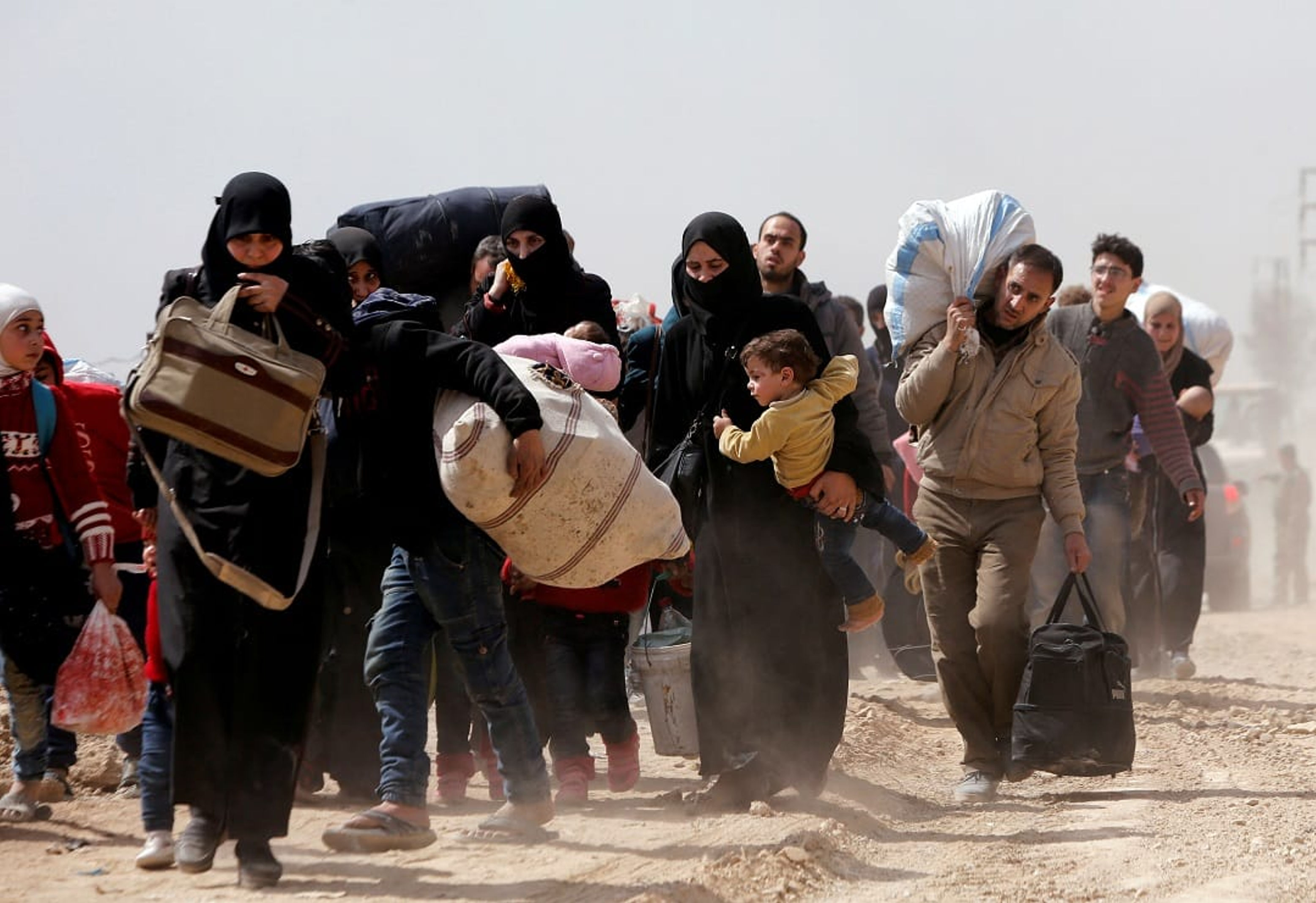 If God is loving, caring, and powerful, why must humans go through pain and suffering?