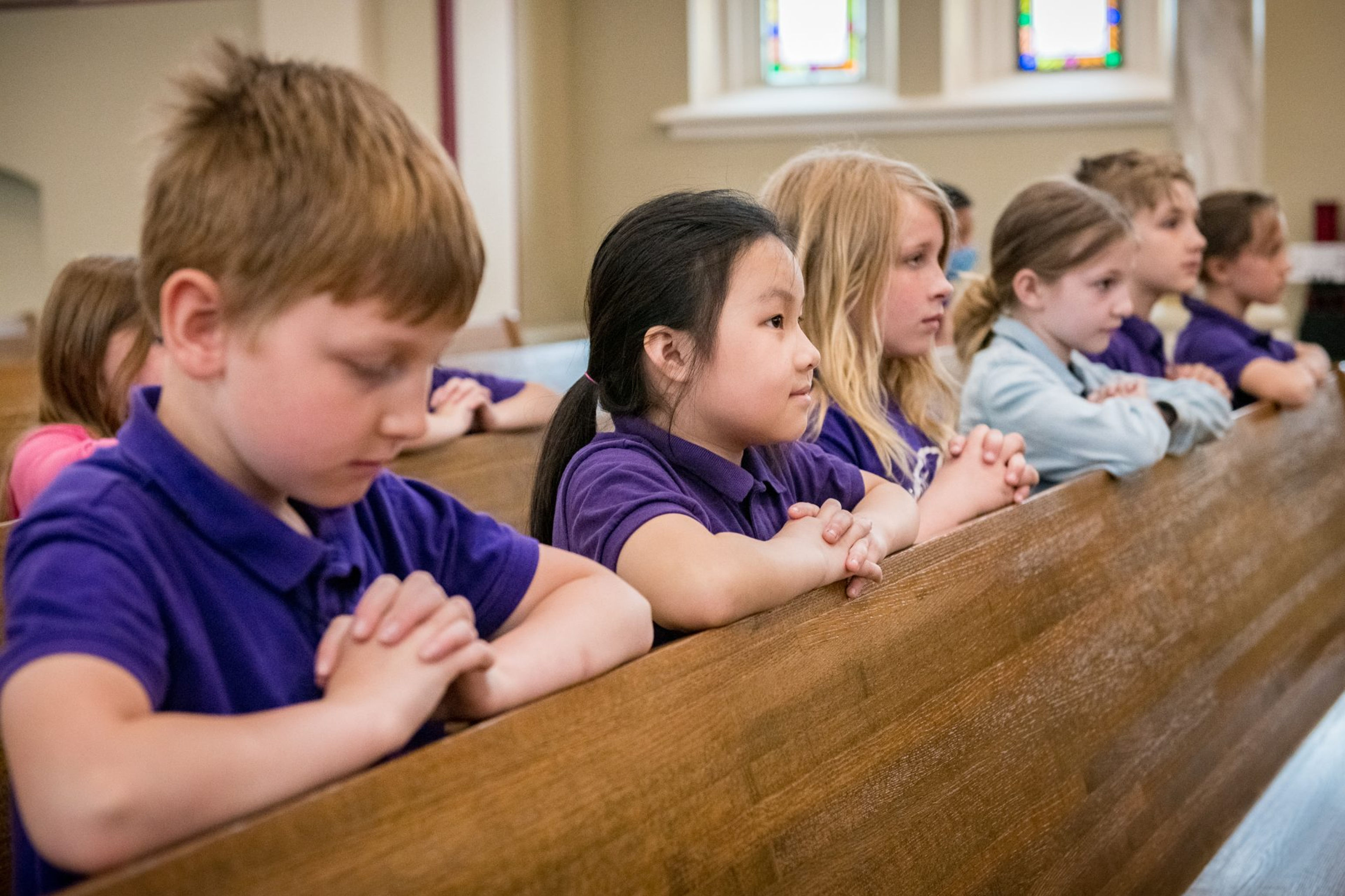 Is it safe for the children of believers to enroll in universities founded by Seventh-day Adventists, Roman Catholics, or non-Christian educational institutions?